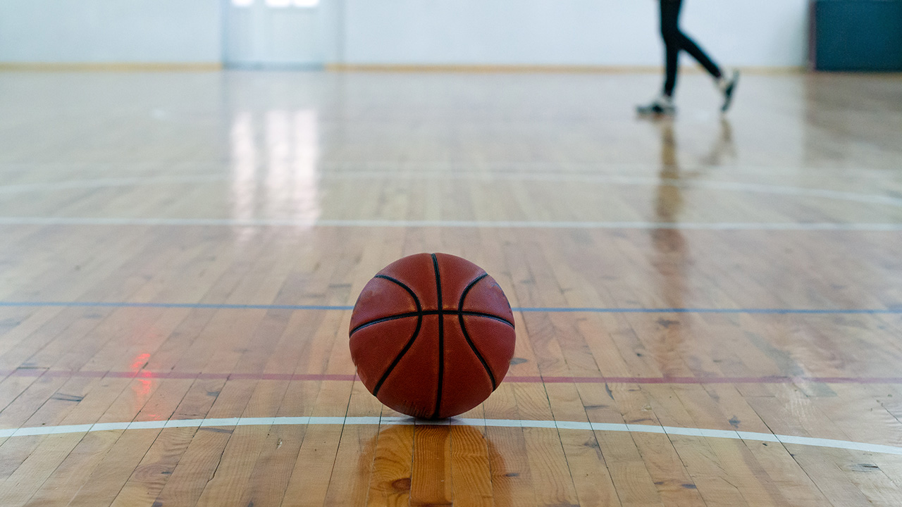 Basketball on court floor