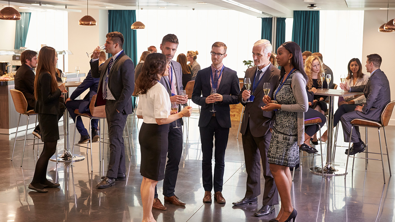 Delegates networking at conference drinks reception