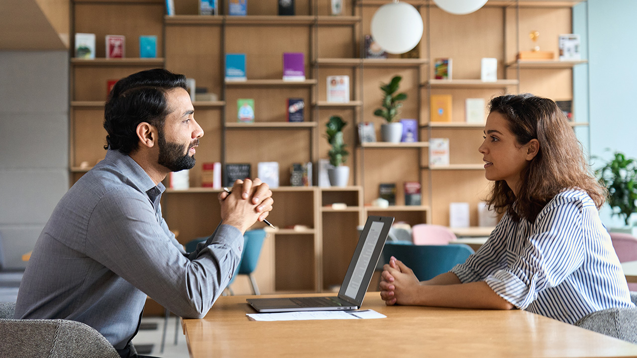 Business owner interviewing prospective employee