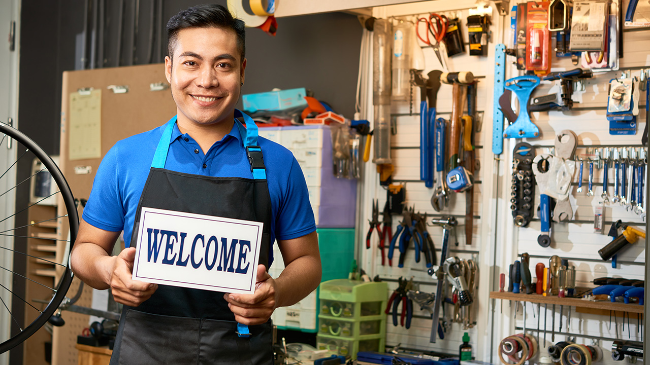 Mechanic Welcoming Customers