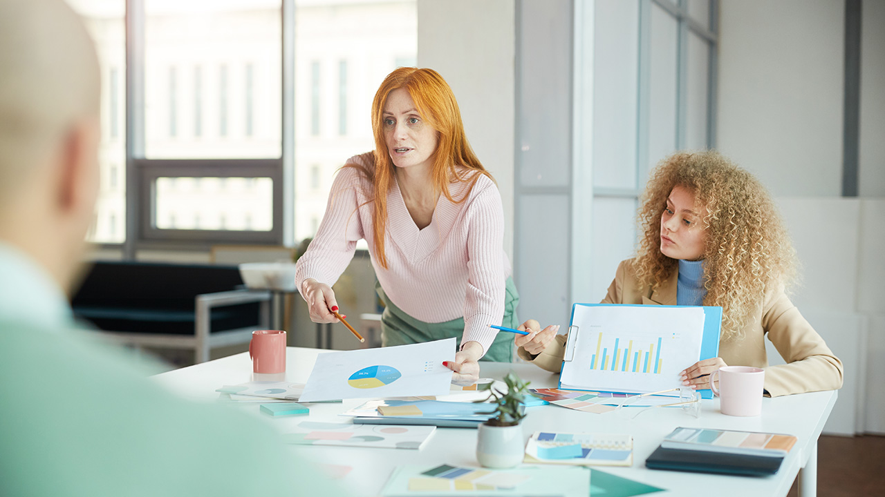 Persuasive Businesswoman in Meeting