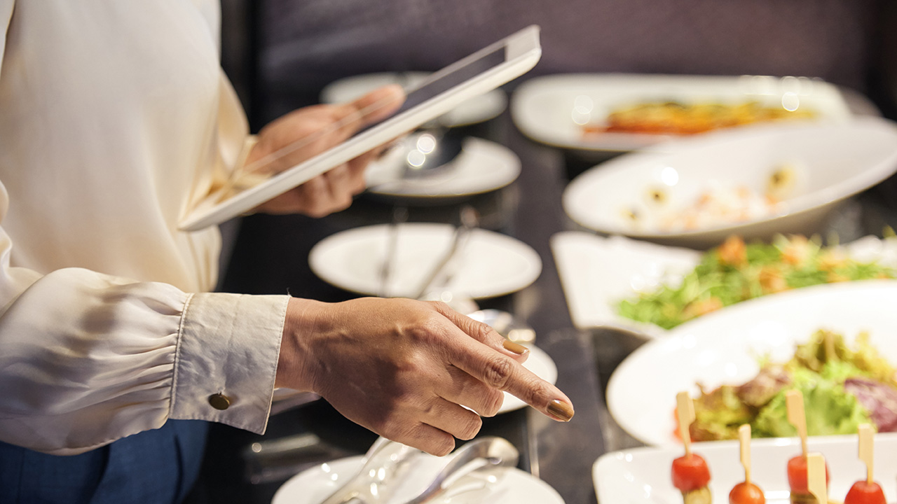 Restaurant Owner Checking Food