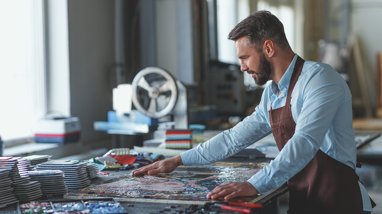 Master craftsman working in studio