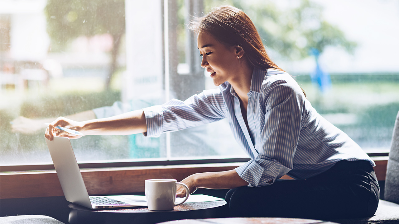 Female entrepreneur working on her laptop