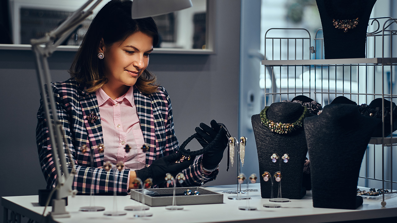 Woman seller in a luxury jewelry store