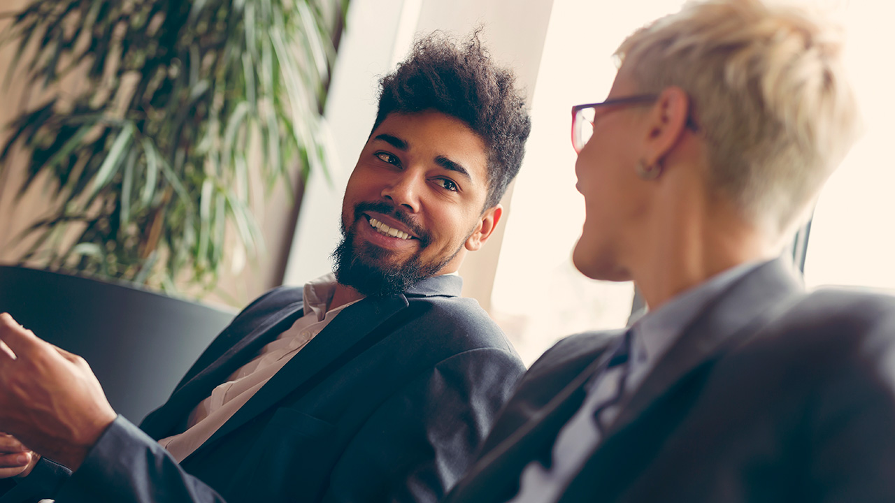 Two Business Colleagues Talking