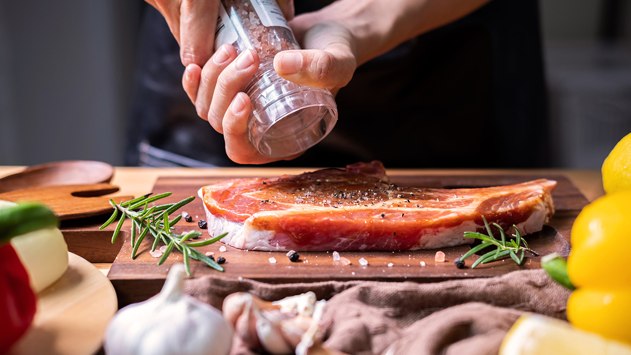 Barbecue Chef Prepares Pork Chop Steak