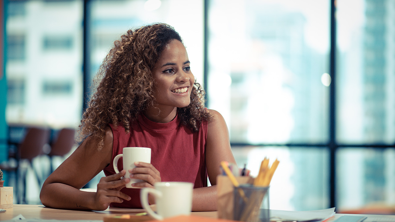 Young Business Woman Working in a Modern Office