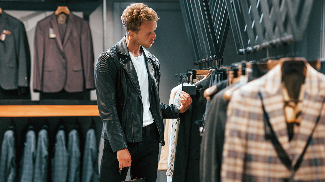 Young Guy in Modern Clothing Store
