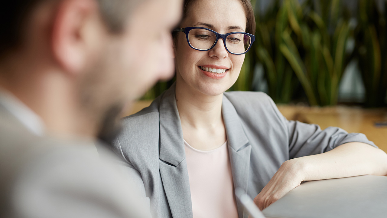 Moment of Negotiation Between Two Business People