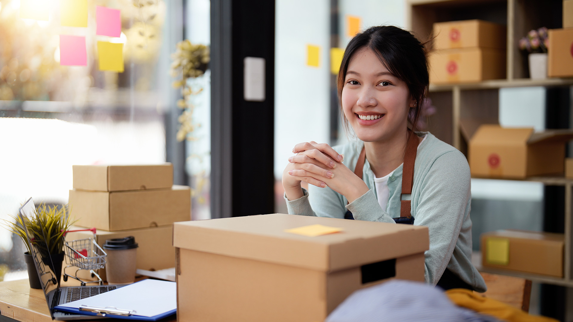 Woman Business Owner Happy About Saving Money